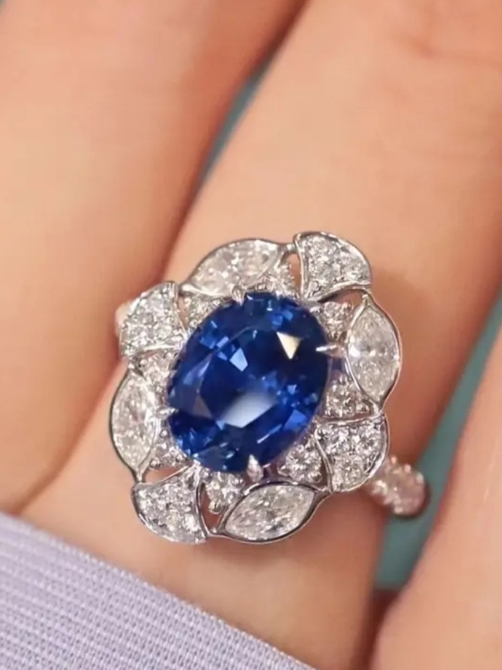White Rhodium Blue Sapphire Halo Ring